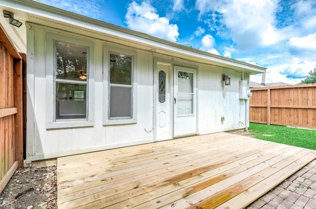 a view of a backyard of a house