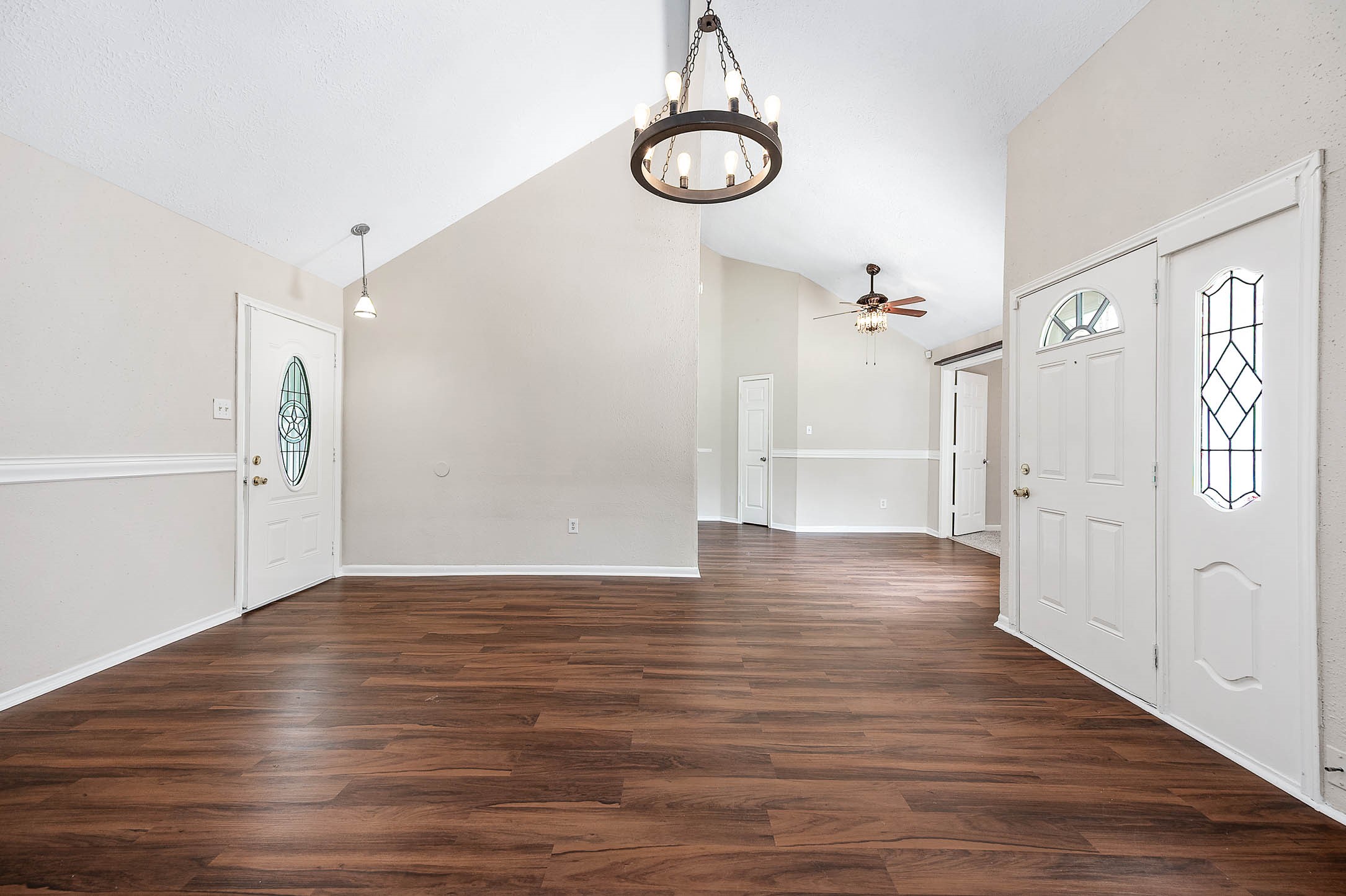 915 West Primrose Meadows Circle Pearland, TX 77584 - Photo 7 of 31 a view of empty room with wooden floor
