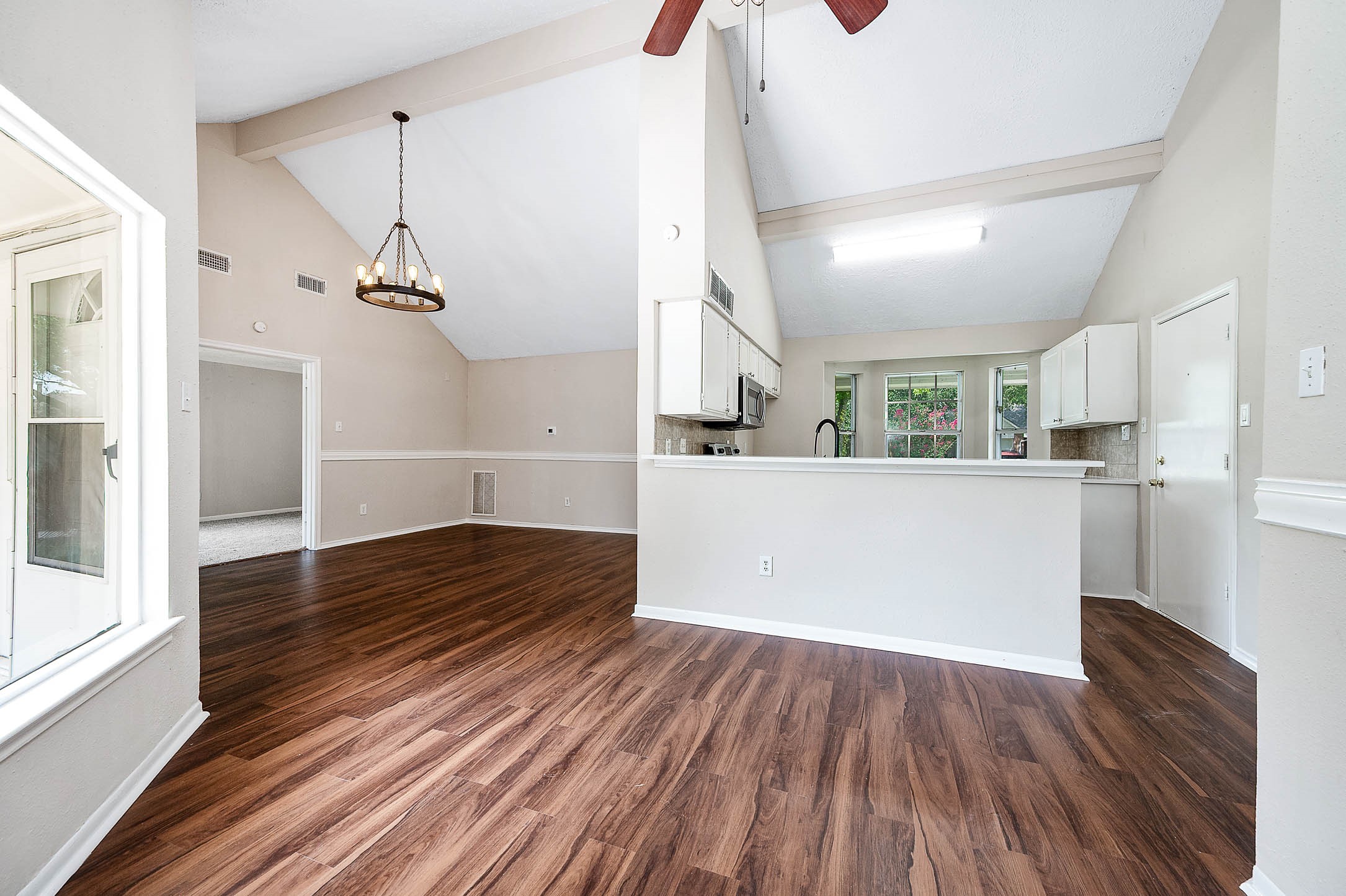 915 West Primrose Meadows Circle Pearland, TX 77584 - Photo 10 of 31 a view of a kitchen and wooden floor