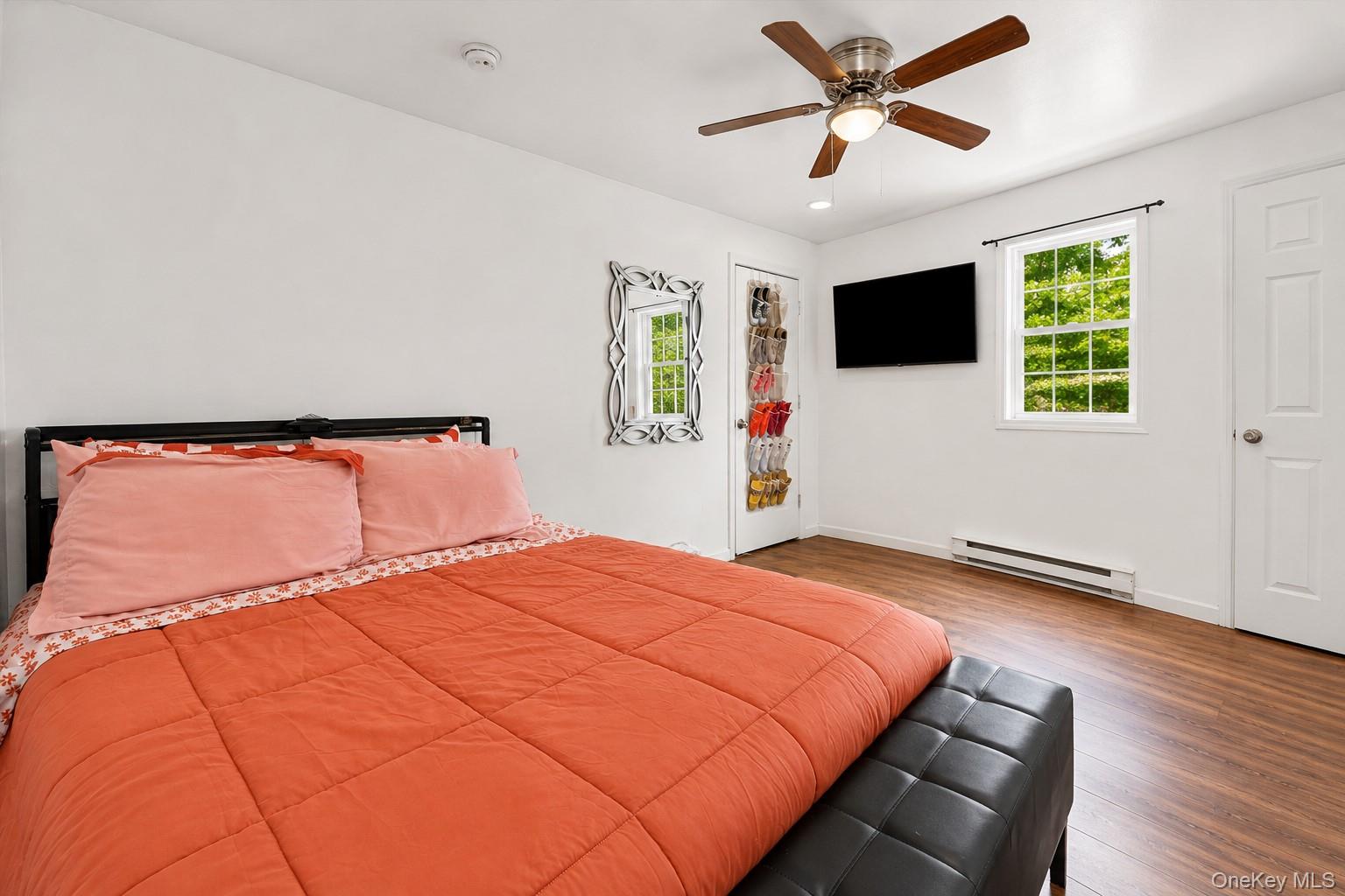 931 Diven Street Peekskill, NY 10566 - Photo 10 of 29 First floor unit lower level unit bedroom two featuring wood-finish flooring