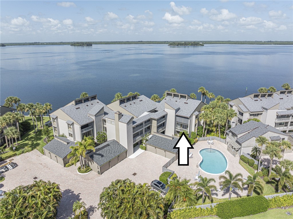 1001 Bay Road, Unit 205 Vero Beach, FL 32963 - Photo 2 of 36 an aerial view of a house with outdoor seating