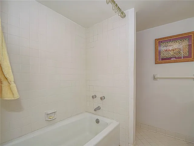 a view of a house with a yard and plants