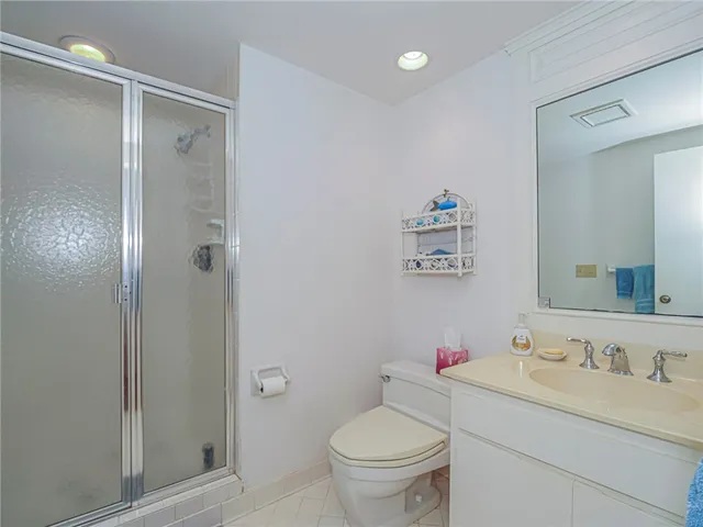 a aerial view of a house with a lake