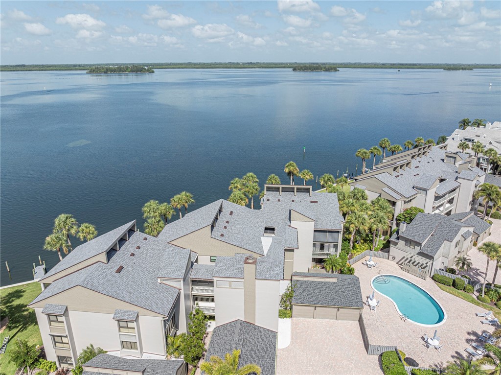 1001 Bay Road, Unit 205 Vero Beach, FL 32963 - Photo 36 of 36 a aerial view of a house with a lake