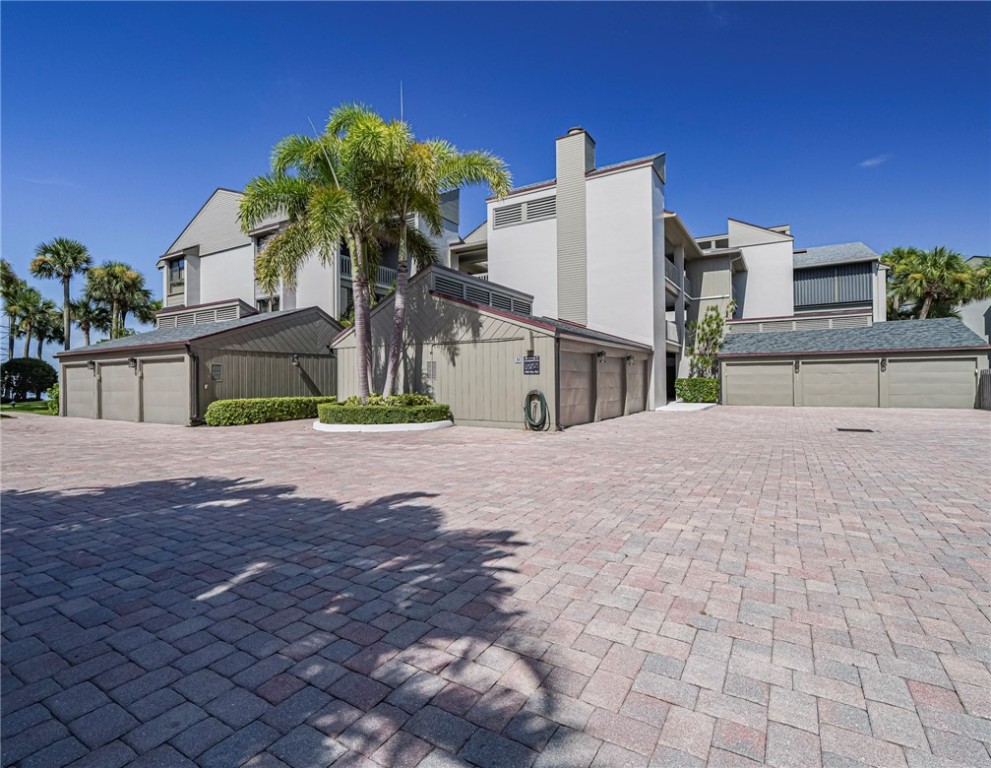 1001 Bay Road, Unit 205 Vero Beach, FL 32963 - Photo 4 of 36 a view of multiple houses with a street