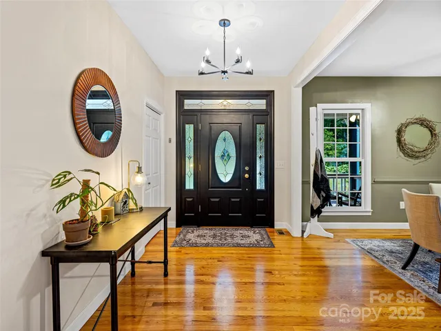 a kitchen with a stove a sink and a refrigerator