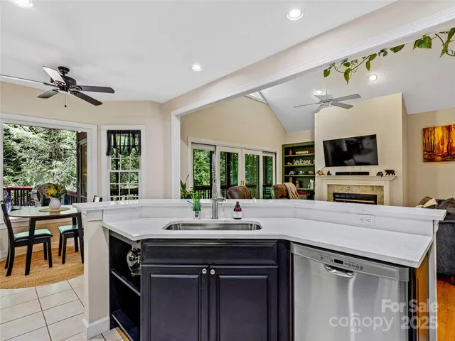 a bedroom with a bed and lamps