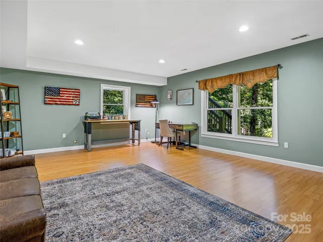 a view of a yard from a balcony