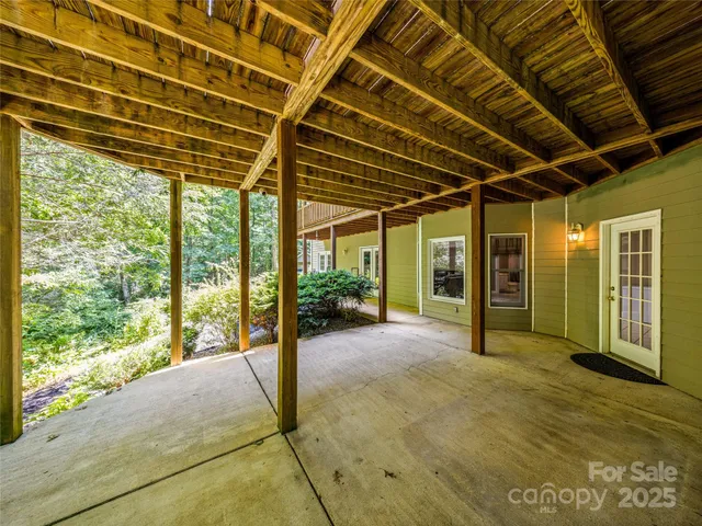 a view of a playground with basketball court