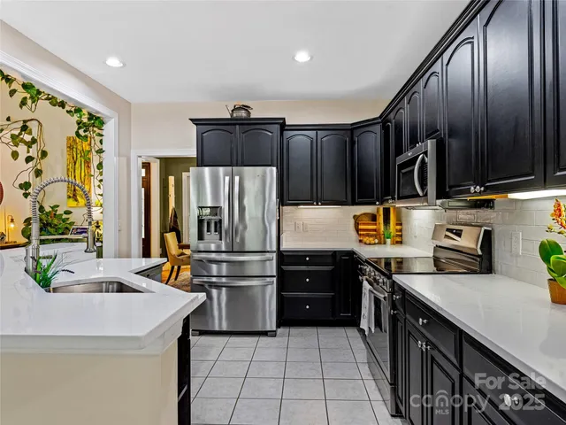 a dining room with furniture window and wooden floor