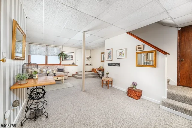 a view of a livingroom with furniture and a couch