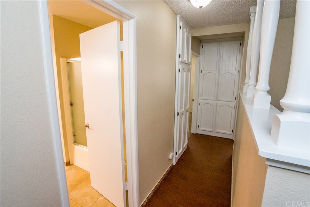 7446 El Morro Way Buena Park, CA 90620 - Photo 12 of 23 a view of a bathroom from a hallway