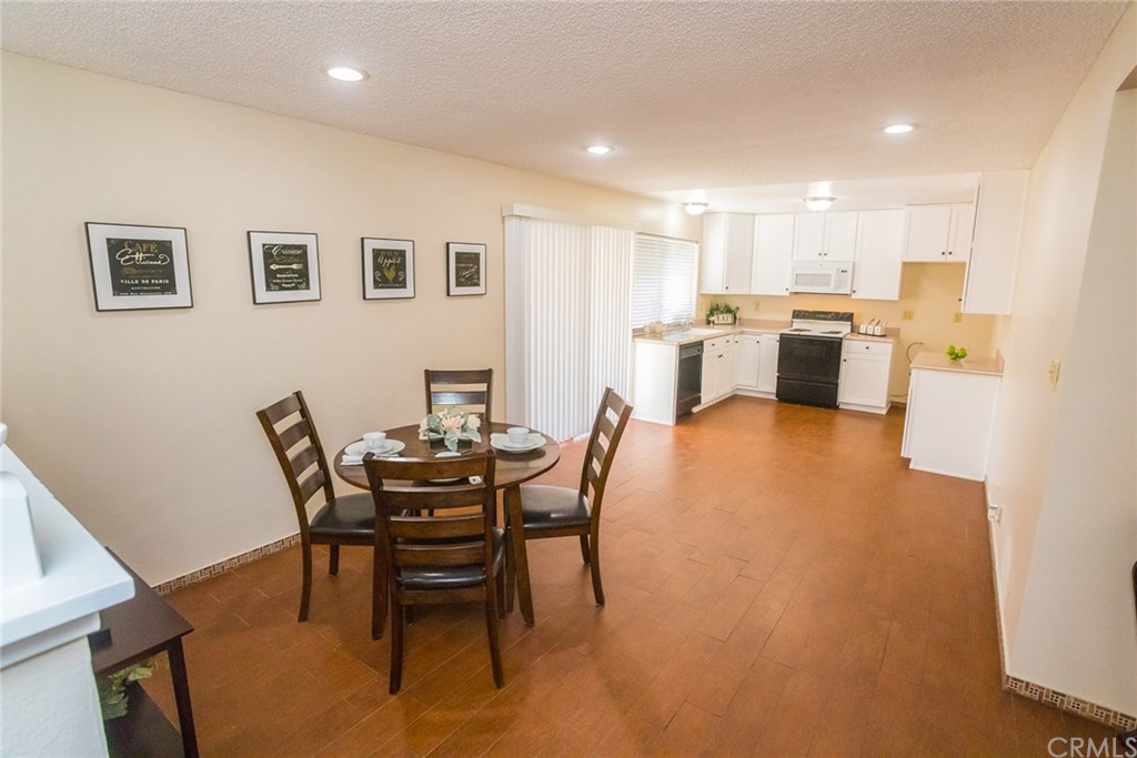 7446 El Morro Way Buena Park, CA 90620 - Photo 7 of 23 a view of a dining room with furniture