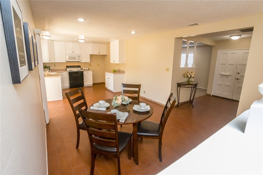 7446 El Morro Way Buena Park, CA 90620 - Photo 10 of 23 a view of a dining room with furniture