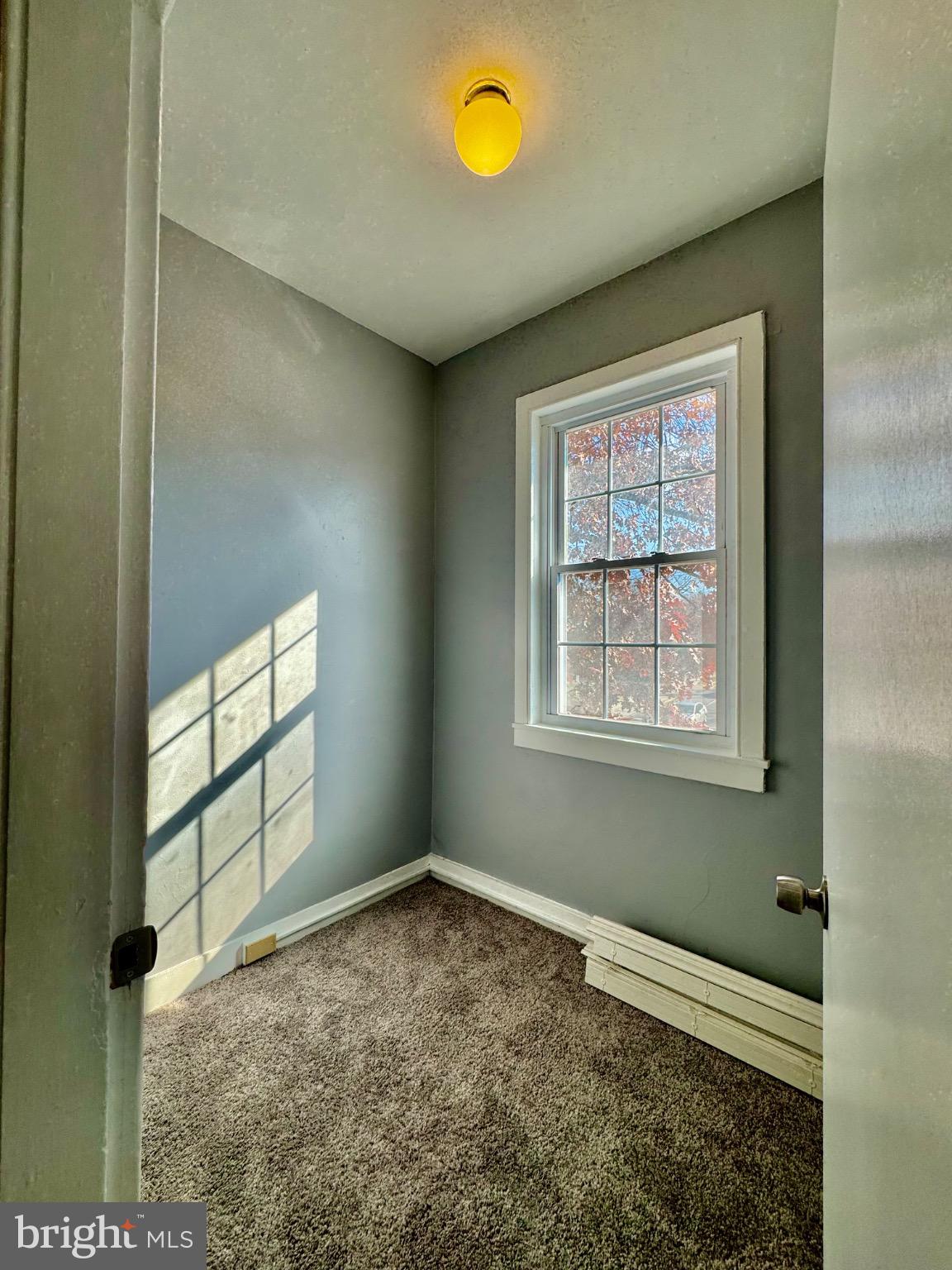 3210 Harford Road Baltimore, MD 21218 - Photo 28 of 33 an empty room with windows