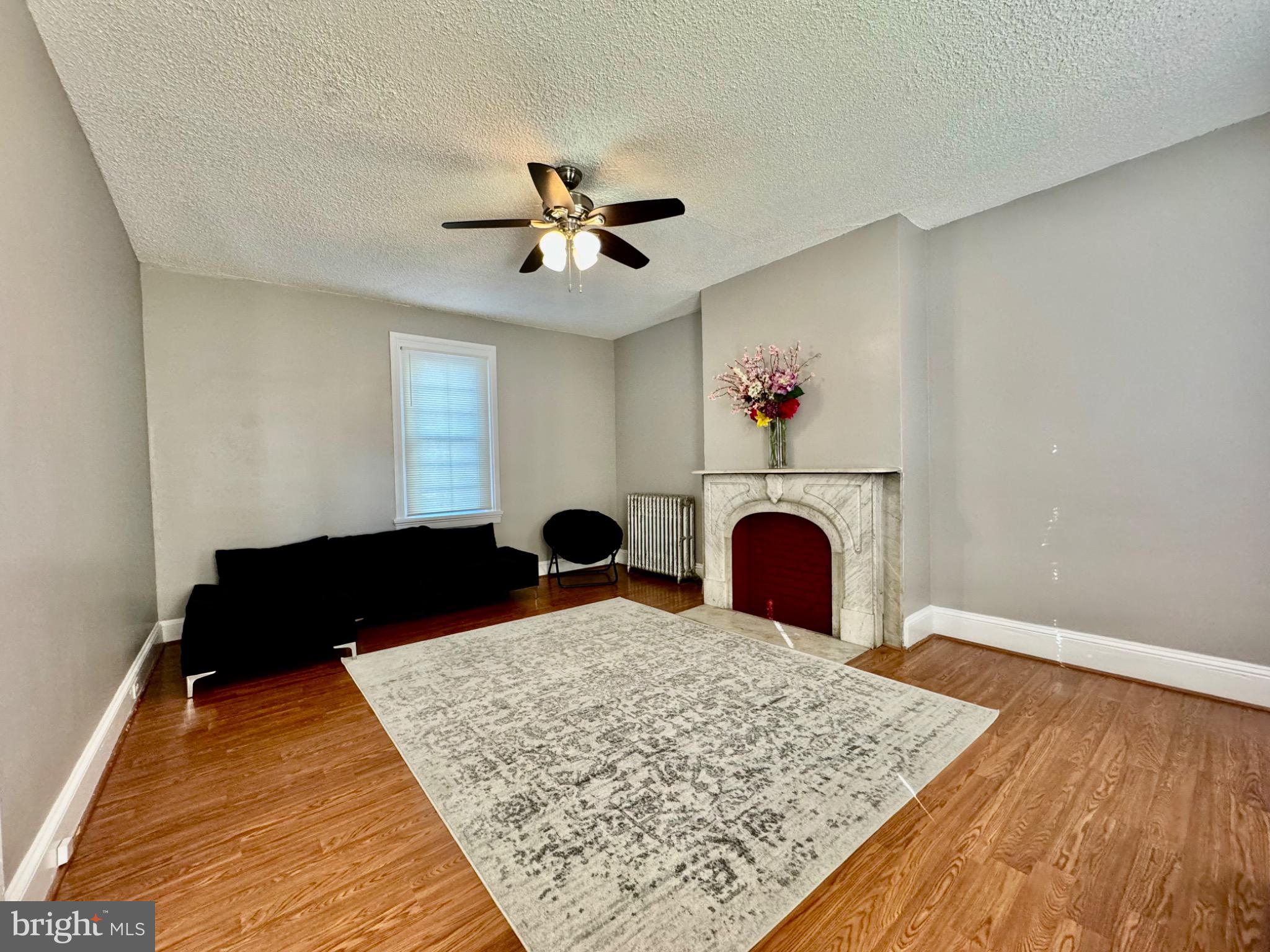 3210 Harford Road Baltimore, MD 21218 - Photo 4 of 33 a living room with a rug