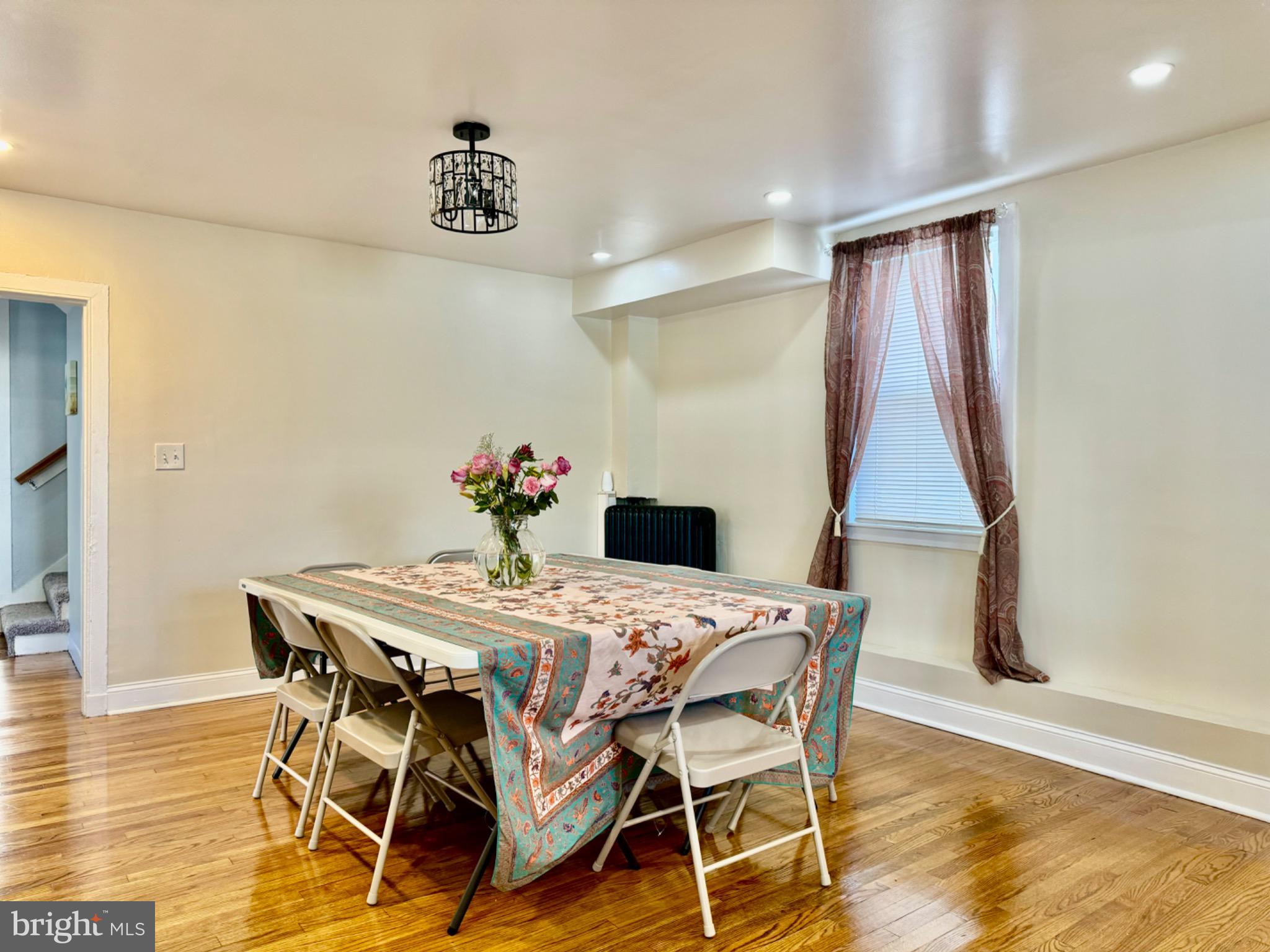 3210 Harford Road Baltimore, MD 21218 - Photo 8 of 33 a dining room with furniture and wooden floor