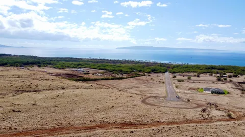 a view of a lake with a beach