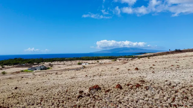 a view of a beach with a yard