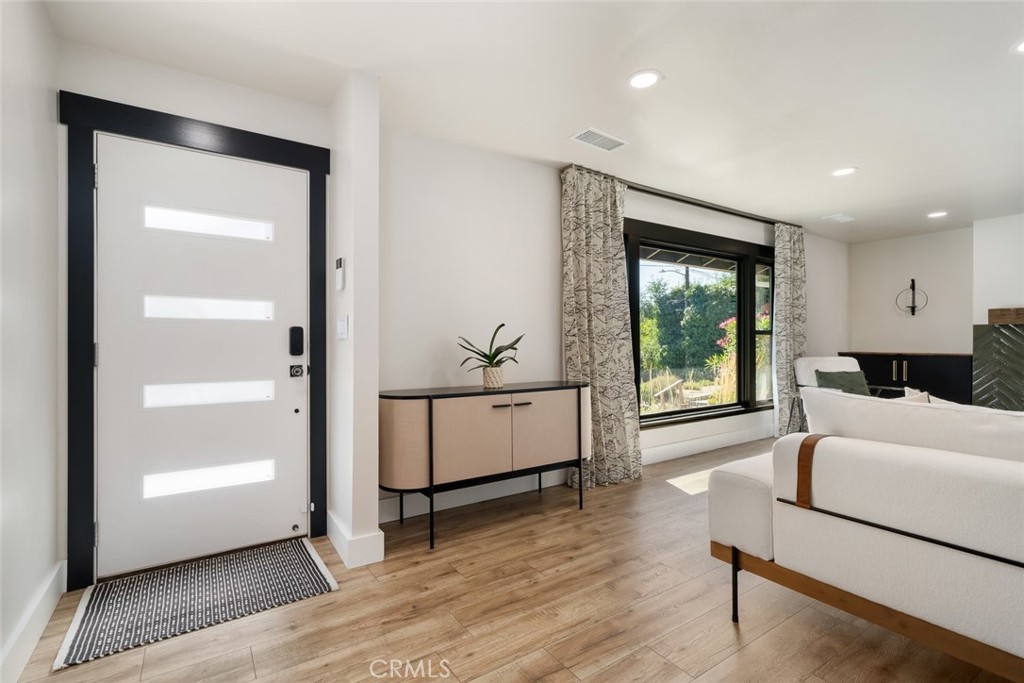 905 Olive Street Paso Robles, CA 93446 - Photo 2 of 61 a living room with furniture and a window