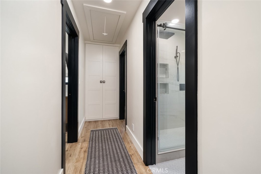 905 Olive Street Paso Robles, CA 93446 - Photo 24 of 61 a view of a hallway with wooden floor