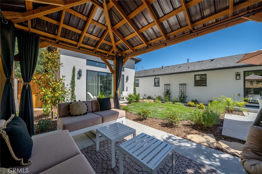 905 Olive Street Paso Robles, CA 93446 - Photo 36 of 61 a view of a house with backyard and sitting area