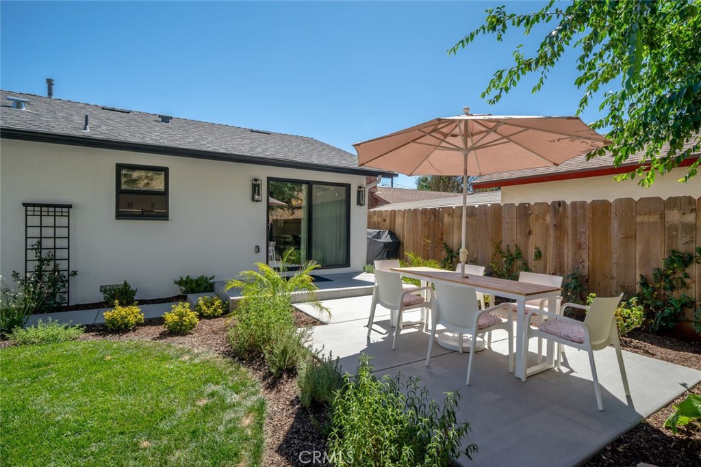 905 Olive Street Paso Robles, CA 93446 - Photo 38 of 61 a view of backyard with outdoor seating and plants