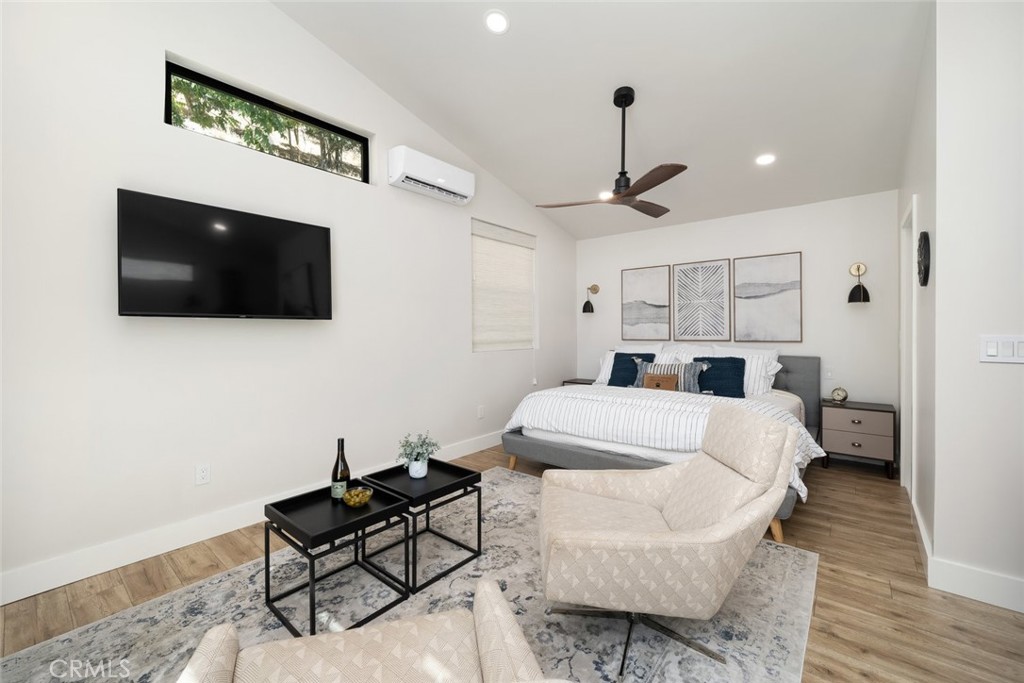 905 Olive Street Paso Robles, CA 93446 - Photo 42 of 61 a living room with furniture and a flat screen tv