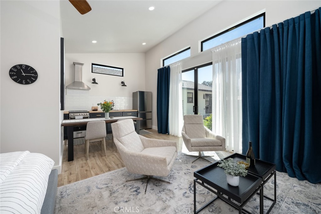 905 Olive Street Paso Robles, CA 93446 - Photo 44 of 61 a living room with furniture and a window