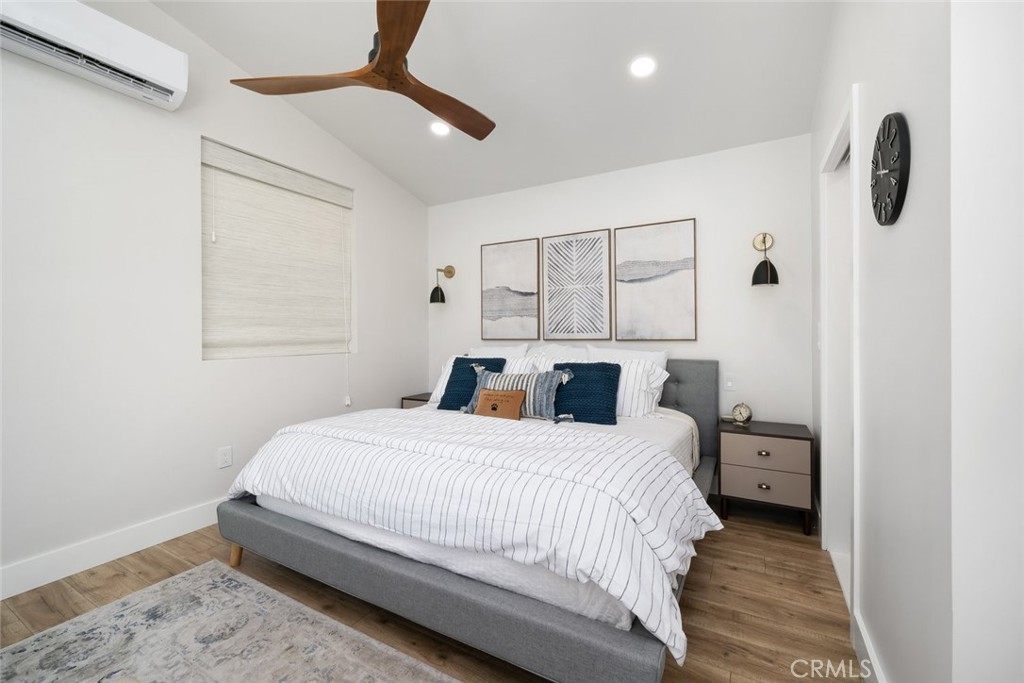 905 Olive Street Paso Robles, CA 93446 - Photo 48 of 61 a bedroom with a bed and a window