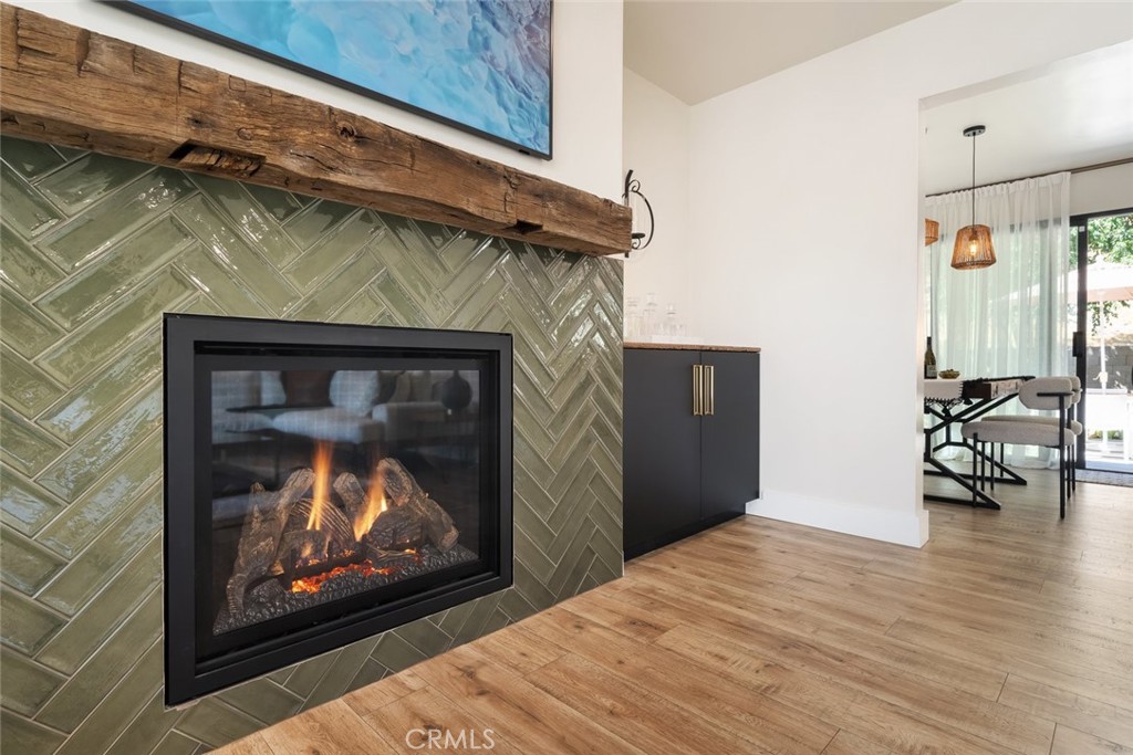 905 Olive Street Paso Robles, CA 93446 - Photo 8 of 61 a living room with furniture and a fireplace