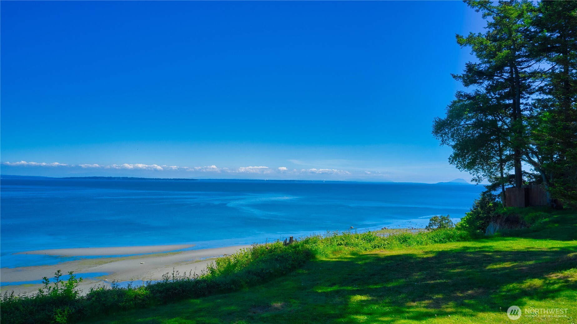 412 High Bluff Dr Point Point Roberts, WA 98281 - Photo 1 of 29 a view of an ocean from a yard