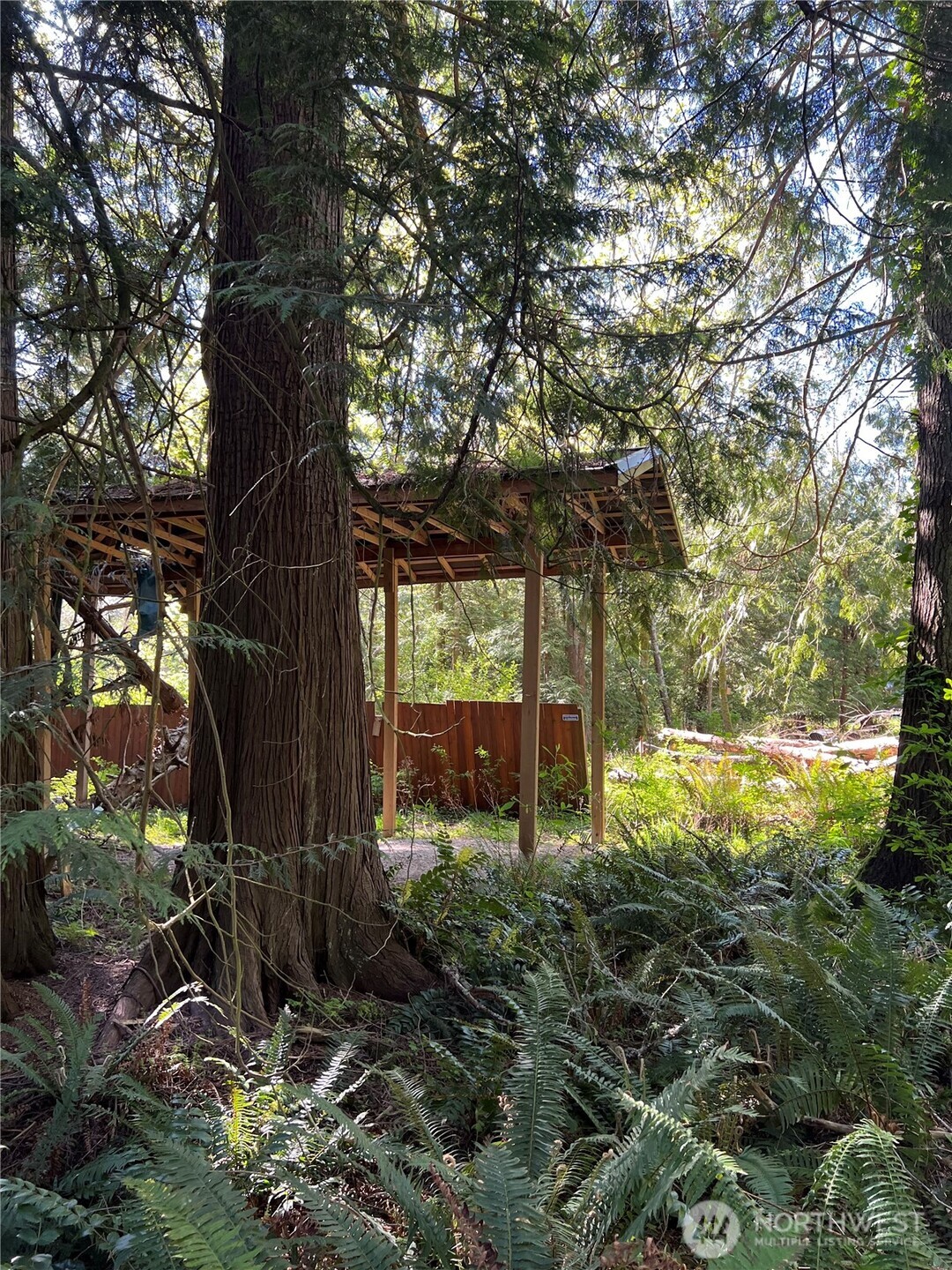 412 High Bluff Dr Point Point Roberts, WA 98281 - Photo 17 of 29 a backyard of a house with lots of green space