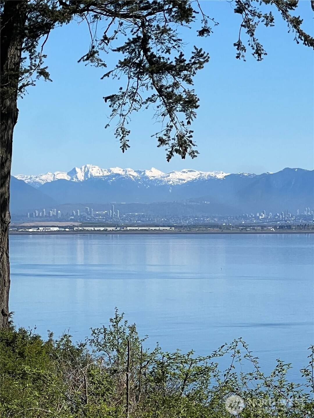 412 High Bluff Dr Point Point Roberts, WA 98281 - Photo 19 of 29 a view of a lake with a mountain and a lake