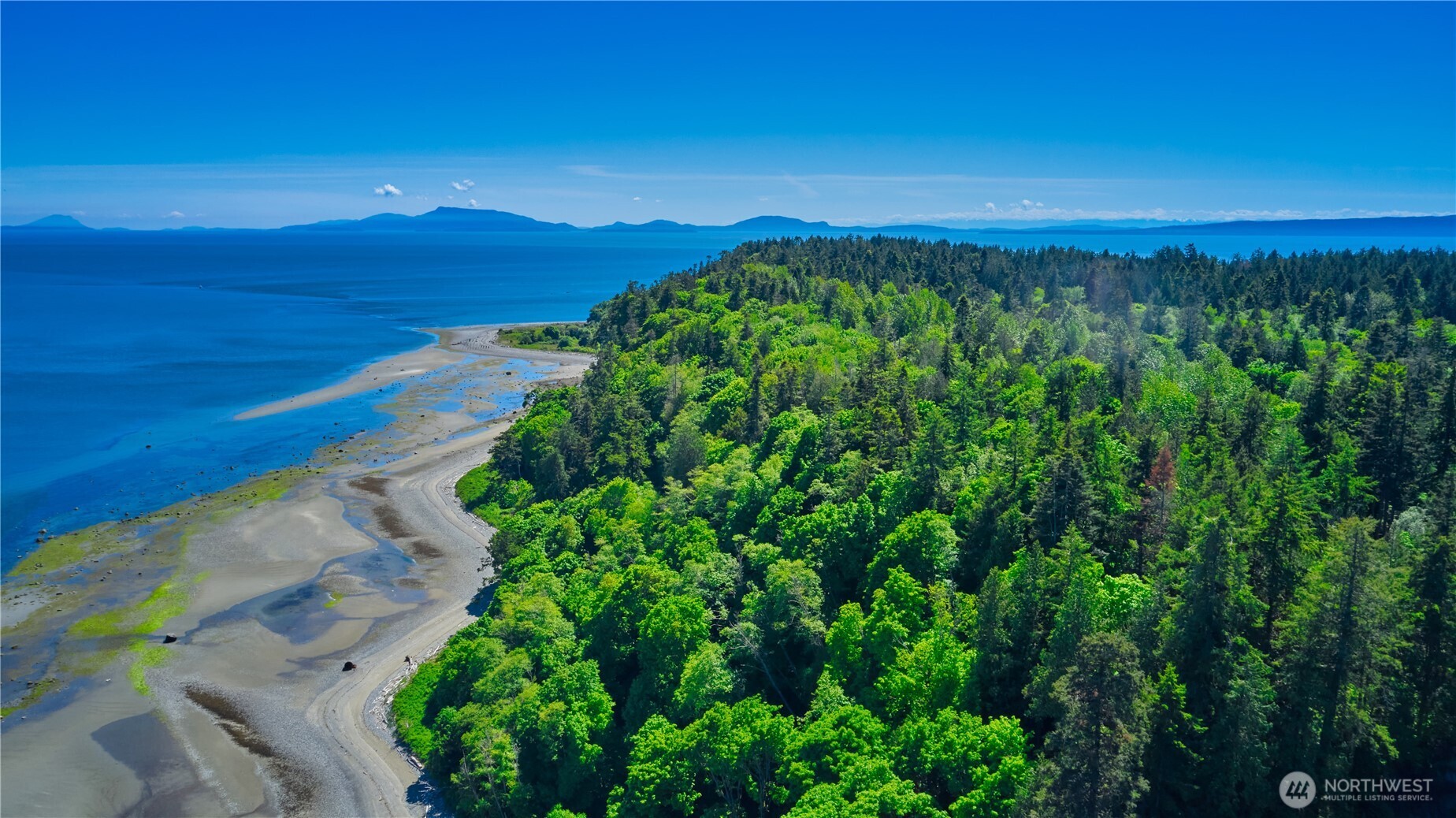 412 High Bluff Dr Point Point Roberts, WA 98281 - Photo 4 of 29 a view of a city with sunset view