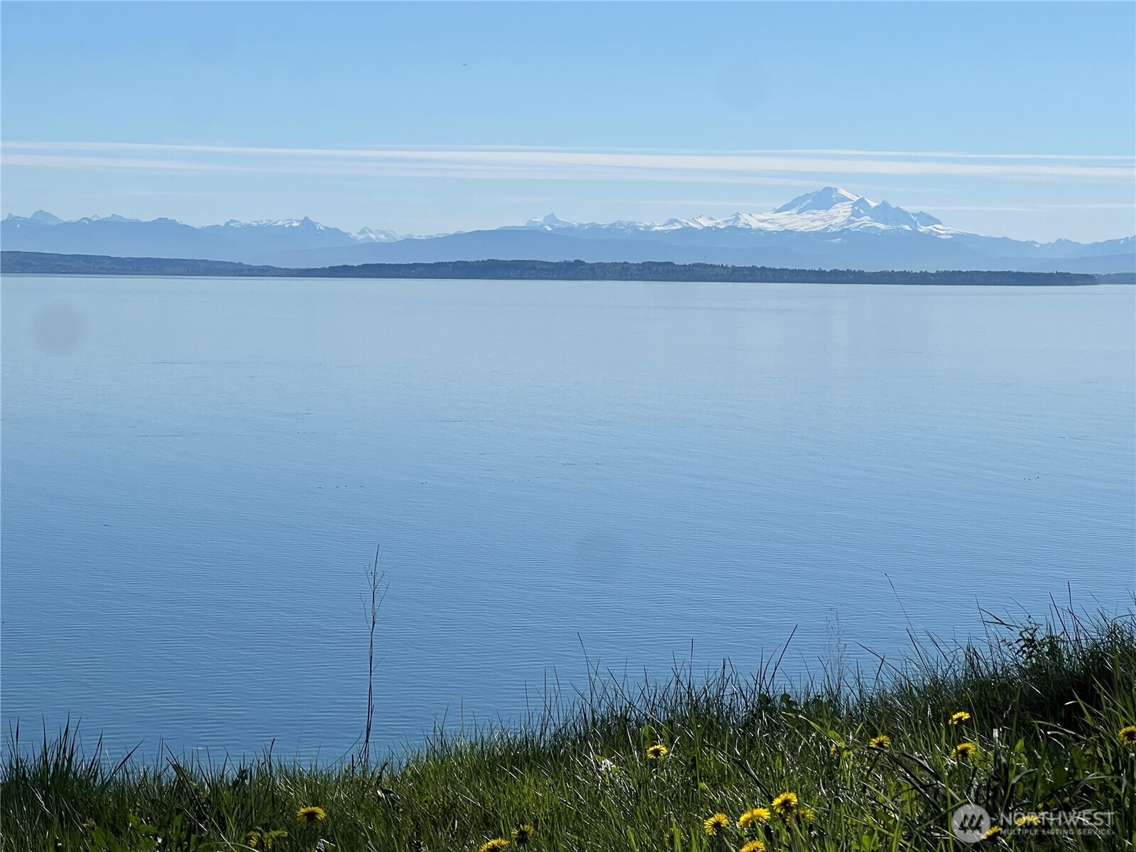412 High Bluff Dr Point Point Roberts, WA 98281 - Photo 6 of 29 a view of a lake and a mountain in the background