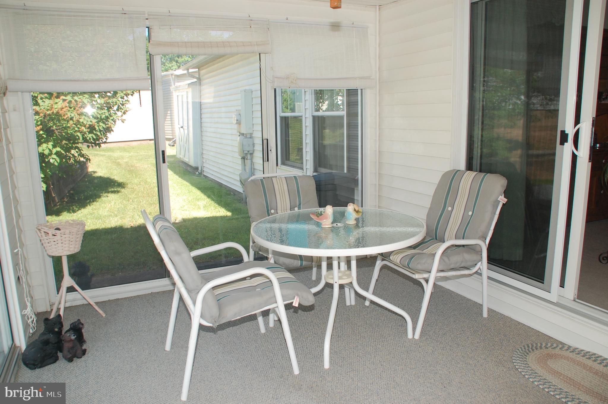 11 Sutton Place Souderton, PA 18964 - Photo 17 of 48 to enjoy the Sun Room that measures 13' x 10'.