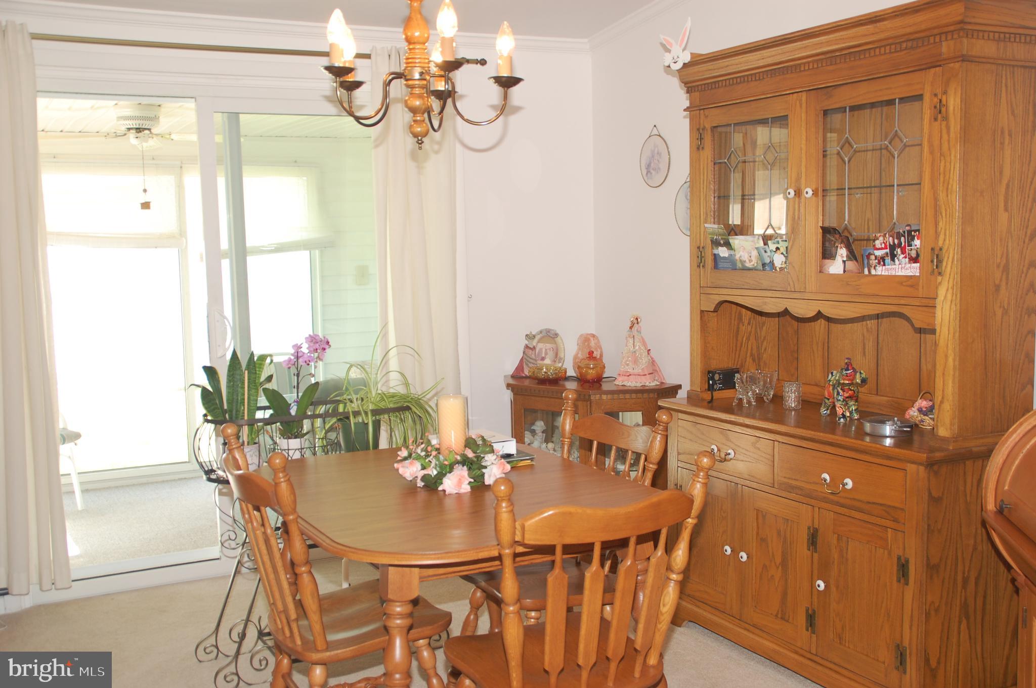 11 Sutton Place Souderton, PA 18964 - Photo 7 of 48 The Dining Room provides access to the Sun Room.