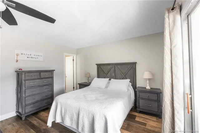 a bedroom with a bed and a closet