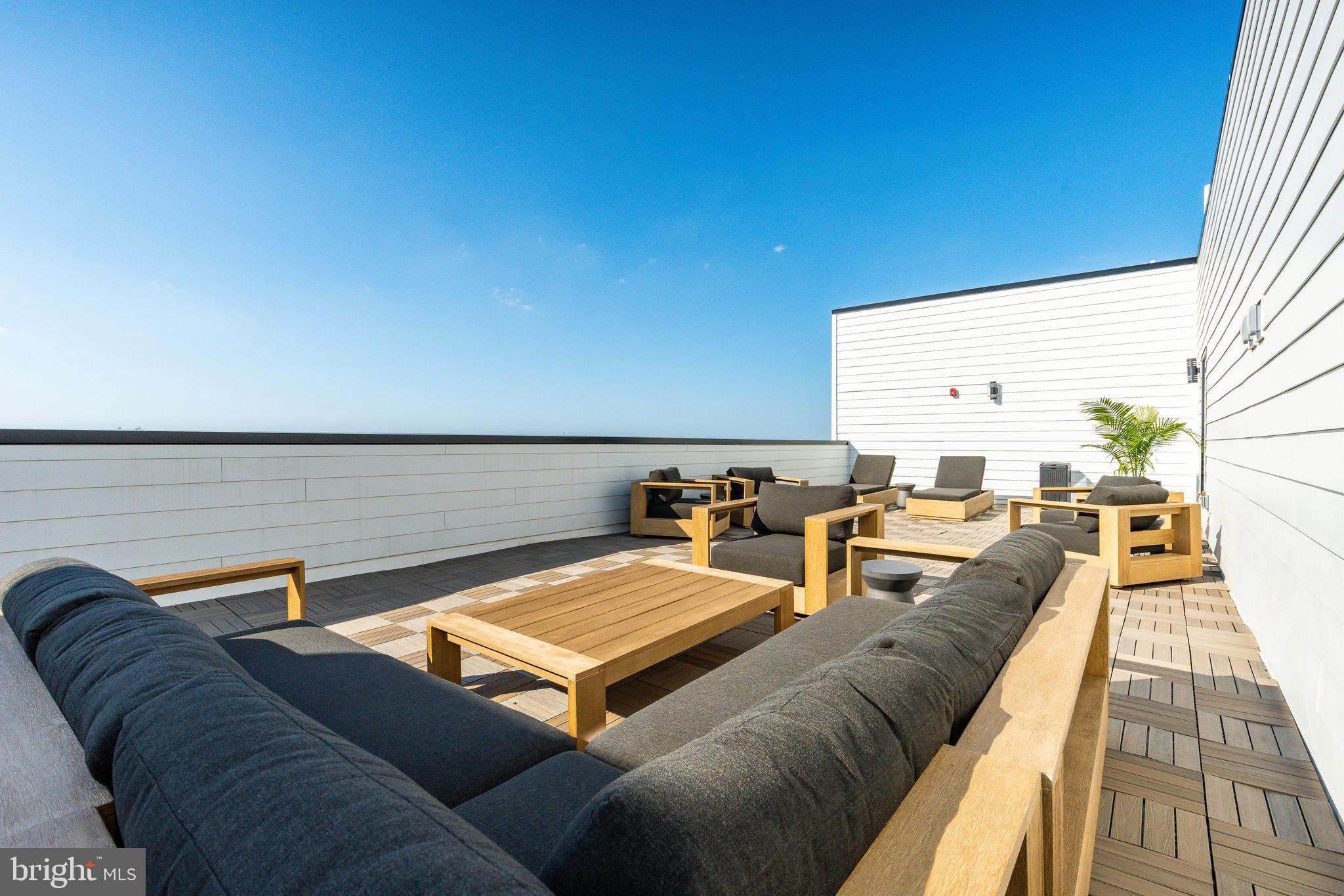 1130 North Delaware Avenue, Unit 307 Philadelphia, PA 19125 - Photo 22 of 30 a living room with furniture and a large window