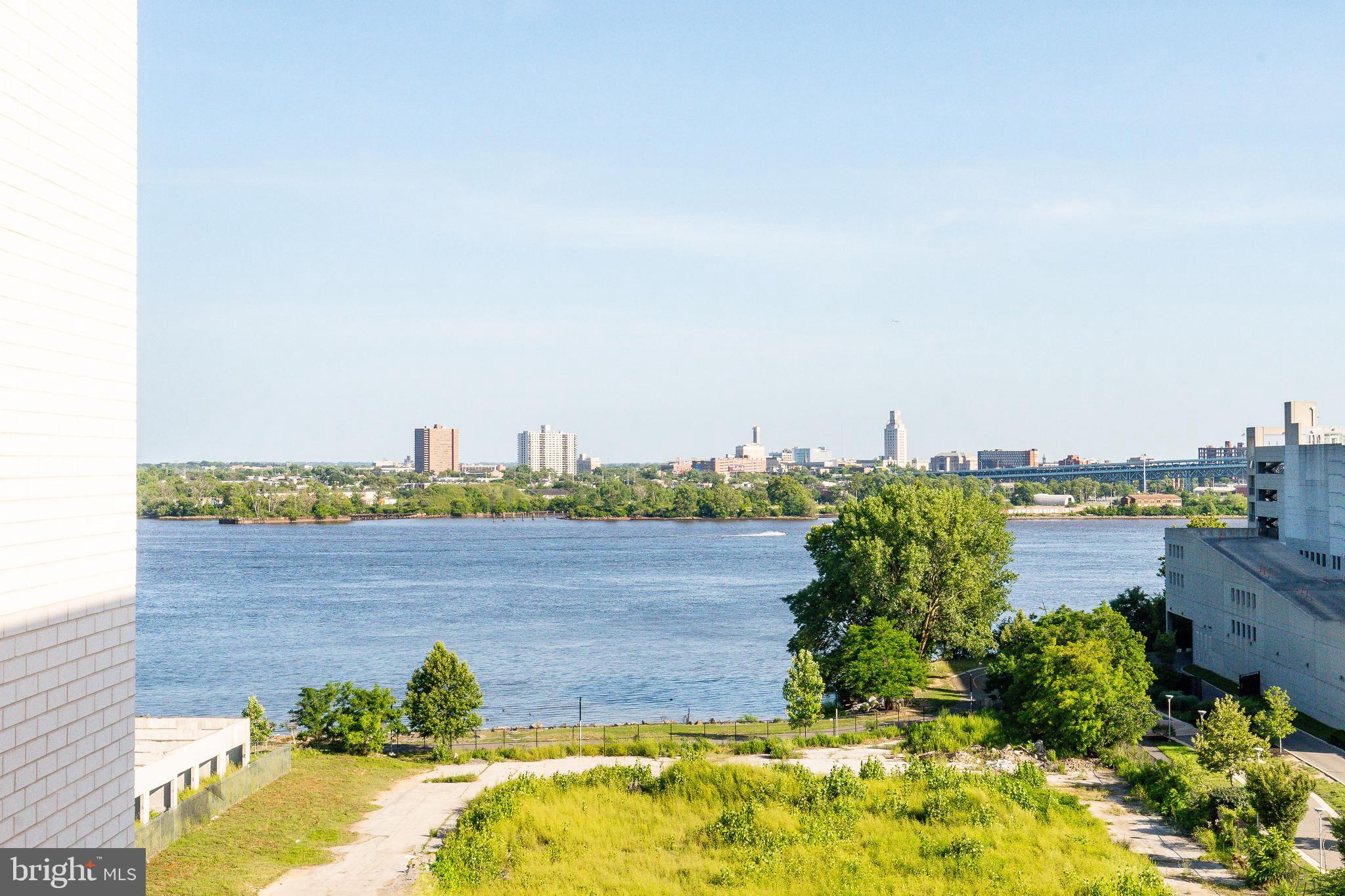 1130 North Delaware Avenue, Unit 307 Philadelphia, PA 19125 - Photo 23 of 30 a view of a lake with a city