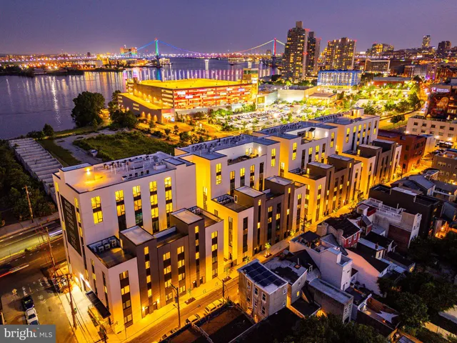 a view of a building with a park