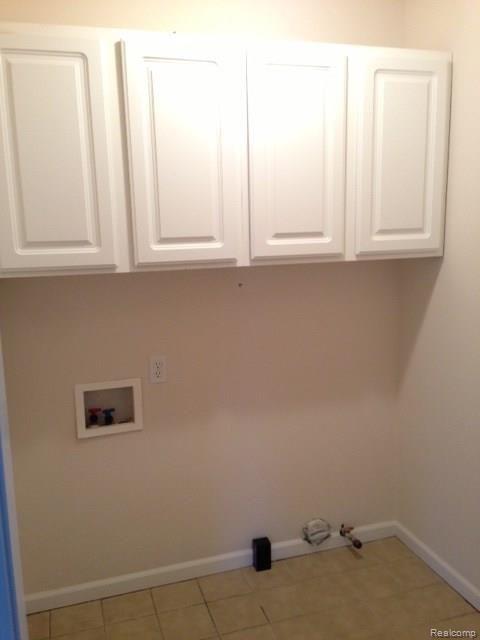 8543 Lee Road Brighton, MI 48116 - Photo 14 of 16 upstairs laundry area