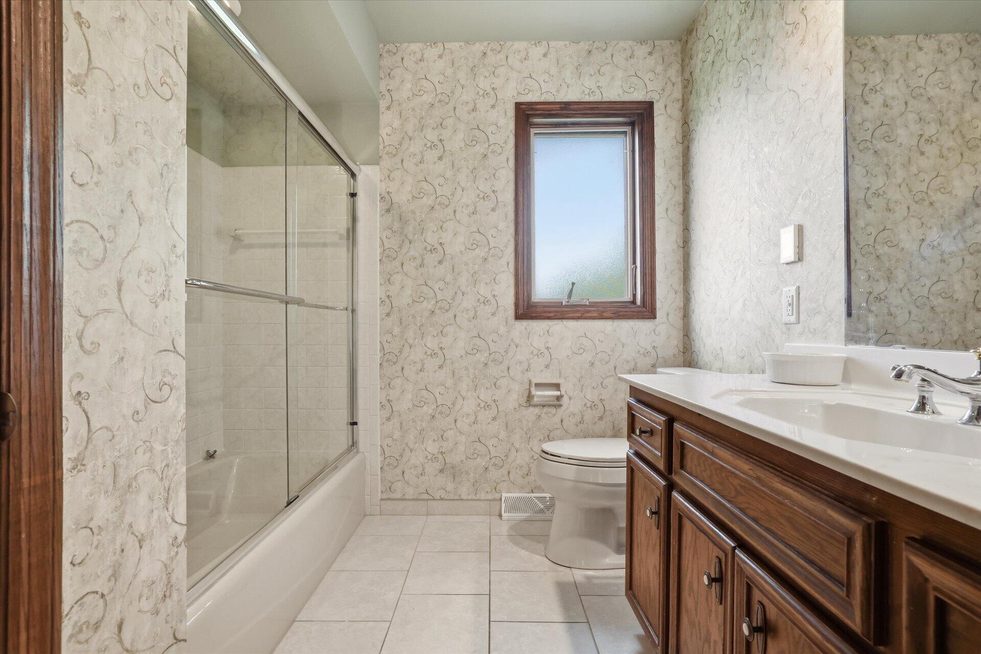 4100 South 119th Street Greenfield, WI 53228 - Photo 13 of 31 Shower over tub and heated floor!