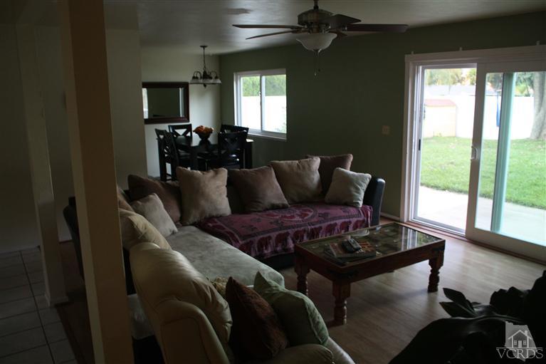 760 Talbert Avenue Simi Valley, CA 93065 - Photo 2 of 12 a living room with furniture and a large window