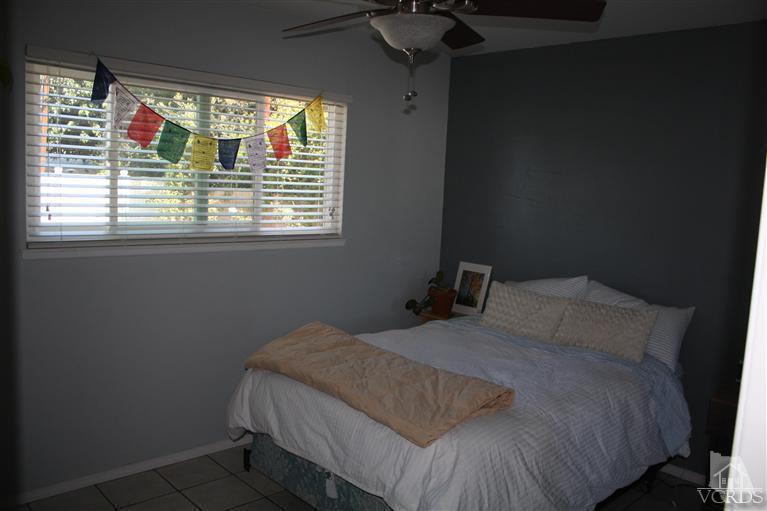 760 Talbert Avenue Simi Valley, CA 93065 - Photo 7 of 12 a bedroom with a bed and a window