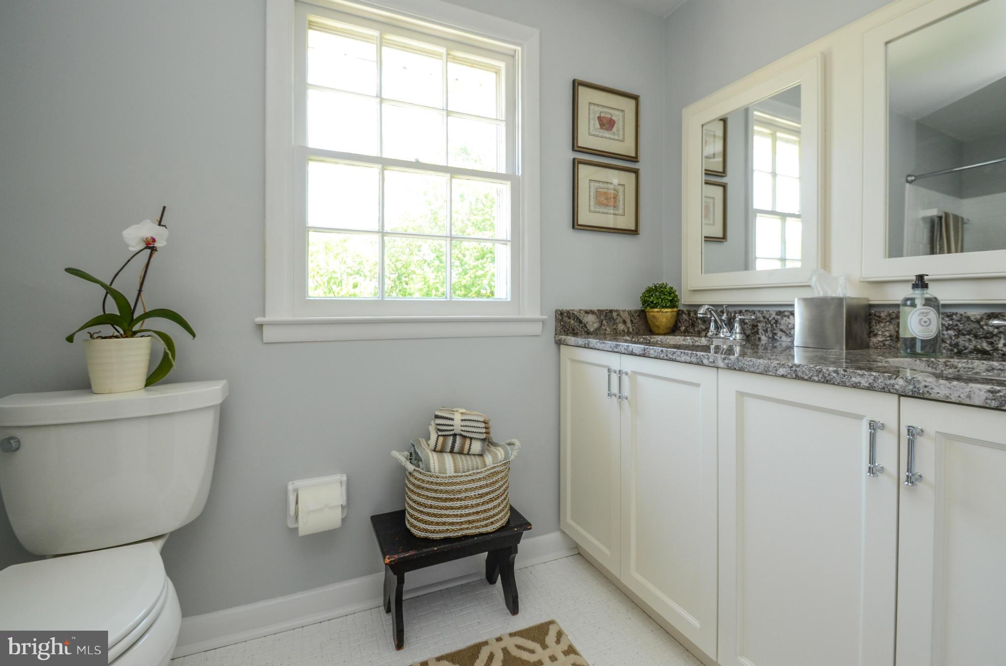 1813 Landrake Road Baltimore, MD 21204 - Photo 23 of 30 Hall Shared Bath with Double Sink Vanity