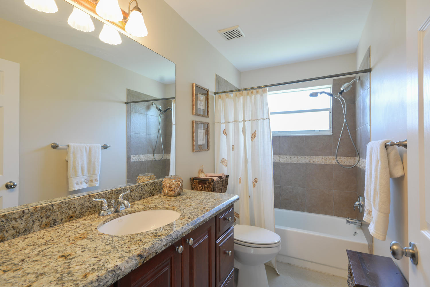 22166 Appleton Drive Boca Raton, FL 33428 - Photo 19 of 47 a bathroom with a granite countertop sink toilet and shower