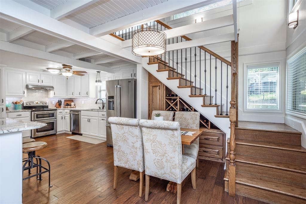 823 Casino Road Nocona, TX 76255 - Photo 11 of 40 a living room with furniture and kitchen view with wooden floor