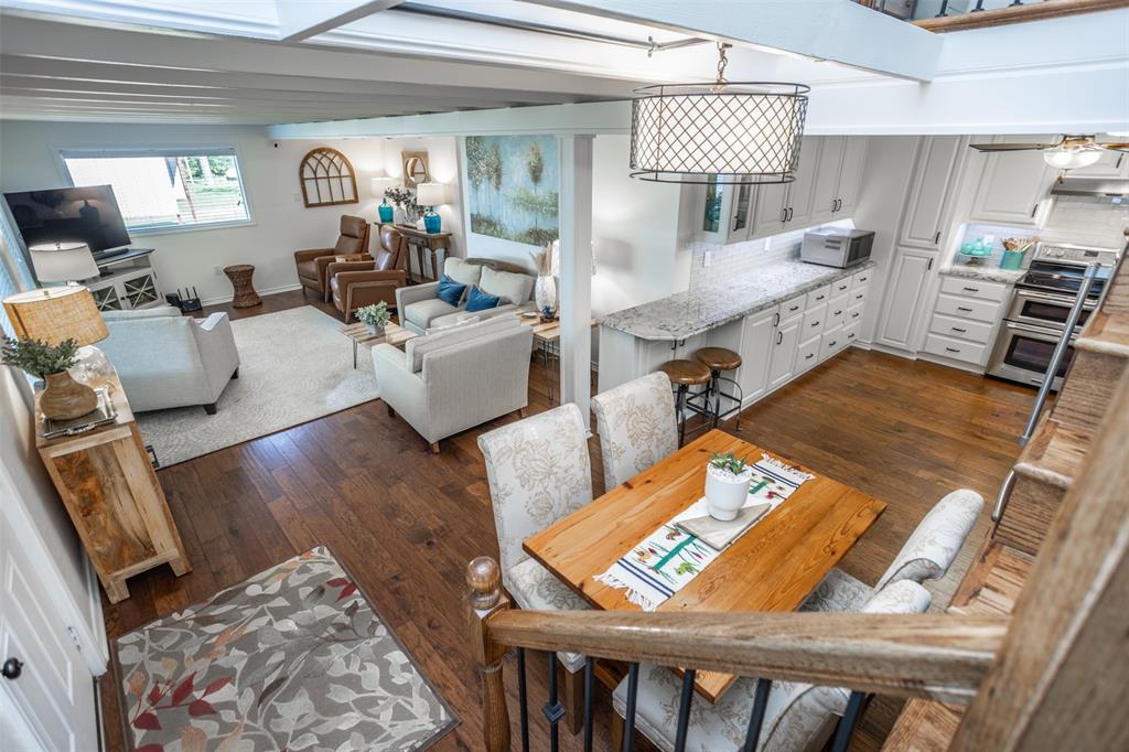 823 Casino Road Nocona, TX 76255 - Photo 23 of 40 a living room with furniture and a wooden floor